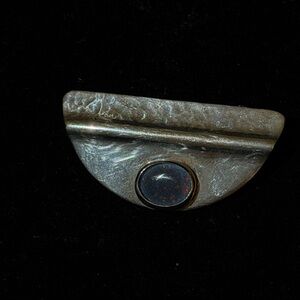 A Brooch Crafted in Sterling Silver.